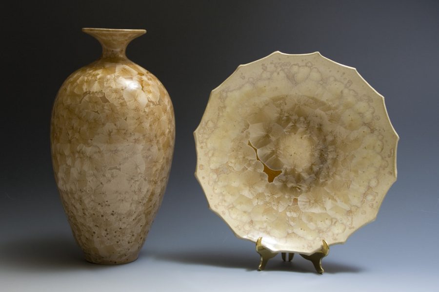 Crystalline glazed vessel and platter on display