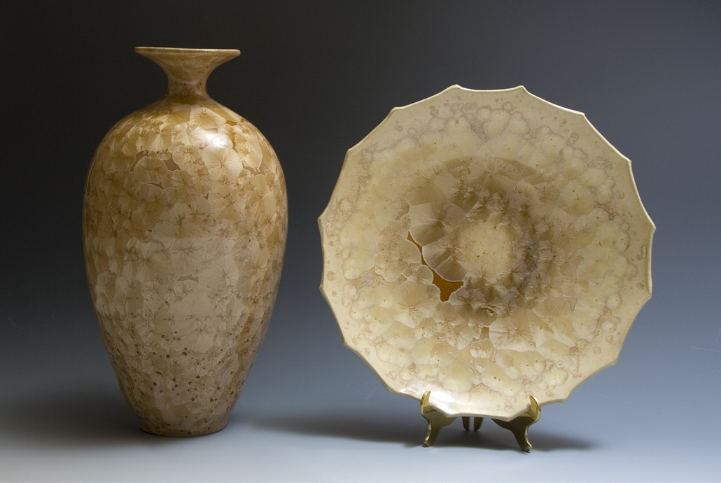 Crystalline glazed vessel and platter on display